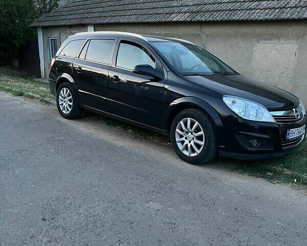 Черный Опель Астра, объемом двигателя 1.69 л и пробегом 220 тыс. км за 5500 $, фото 1 на Automoto.ua