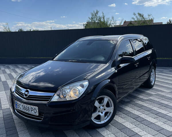 Черный Опель Астра, объемом двигателя 1.7 л и пробегом 311 тыс. км за 5200 $, фото 1 на Automoto.ua