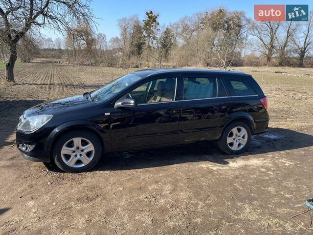 Черный Опель Астра, объемом двигателя 1.6 л и пробегом 295 тыс. км за 4850 $, фото 1 на Automoto.ua