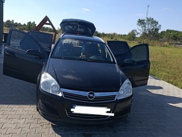 Черный Опель Астра, объемом двигателя 1.6 л и пробегом 224 тыс. км за 5200 $, фото 1 на Automoto.ua