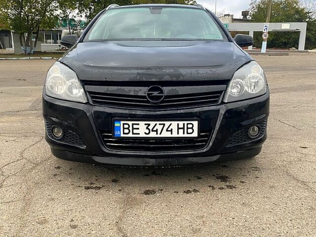 Черный Опель Астра, объемом двигателя 1.6 л и пробегом 225 тыс. км за 4900 $, фото 1 на Automoto.ua