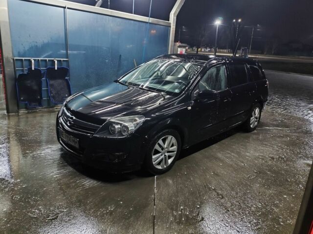 Черный Опель Астра, объемом двигателя 1.6 л и пробегом 226 тыс. км за 5900 $, фото 1 на Automoto.ua