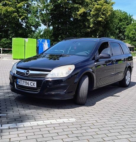 Черный Опель Астра, объемом двигателя 1.7 л и пробегом 260 тыс. км за 4700 $, фото 1 на Automoto.ua