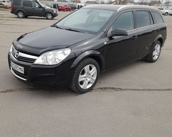 Черный Опель Астра, объемом двигателя 1.6 л и пробегом 219 тыс. км за 5700 $, фото 1 на Automoto.ua