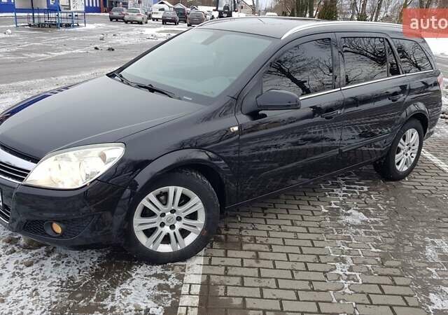 Черный Опель Астра, объемом двигателя 1.7 л и пробегом 332 тыс. км за 5599 $, фото 1 на Automoto.ua