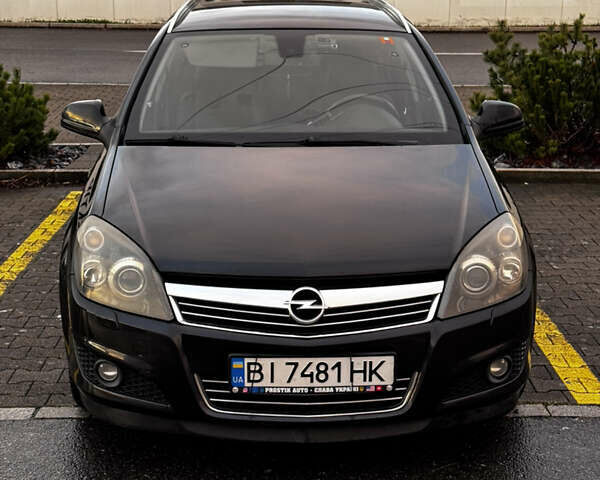 Черный Опель Астра, объемом двигателя 1.69 л и пробегом 268 тыс. км за 8000 $, фото 1 на Automoto.ua