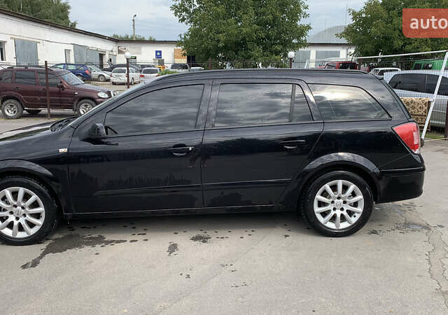 Черный Опель Астра, объемом двигателя 1.6 л и пробегом 242 тыс. км за 5800 $, фото 1 на Automoto.ua