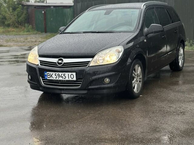 Черный Опель Астра, объемом двигателя 1.6 л и пробегом 212 тыс. км за 6300 $, фото 1 на Automoto.ua
