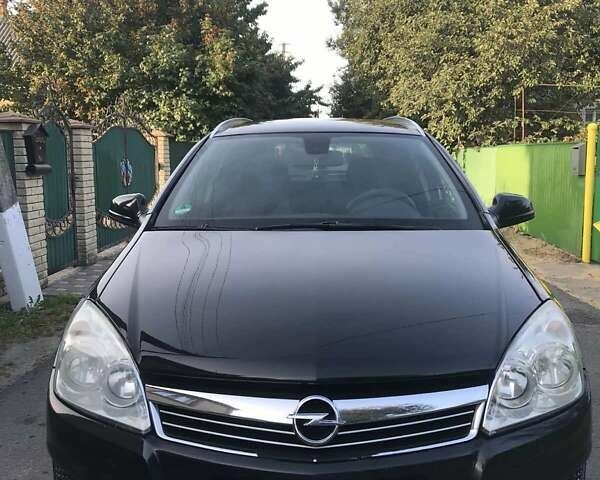 Черный Опель Астра, объемом двигателя 1.69 л и пробегом 295 тыс. км за 6100 $, фото 1 на Automoto.ua