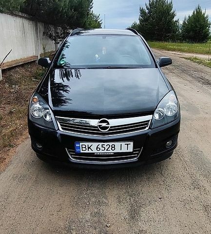 Черный Опель Астра, объемом двигателя 1.6 л и пробегом 183 тыс. км за 5350 $, фото 1 на Automoto.ua