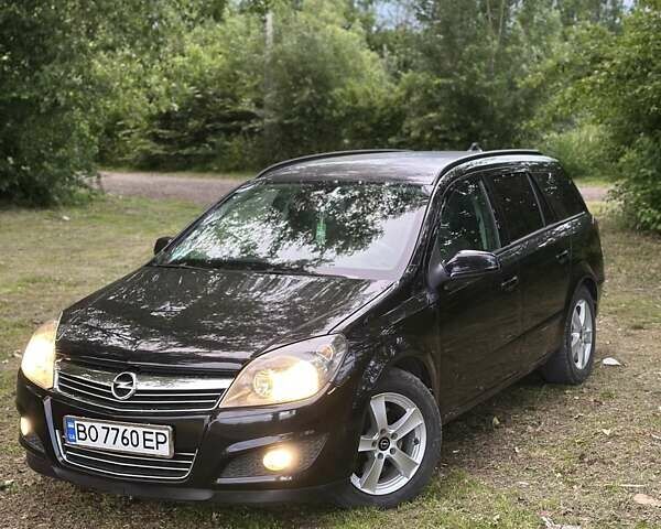Черный Опель Астра, объемом двигателя 1.69 л и пробегом 250 тыс. км за 6500 $, фото 1 на Automoto.ua