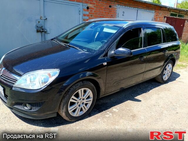Черный Опель Астра, объемом двигателя 1.6 л и пробегом 210 тыс. км за 6700 $, фото 1 на Automoto.ua