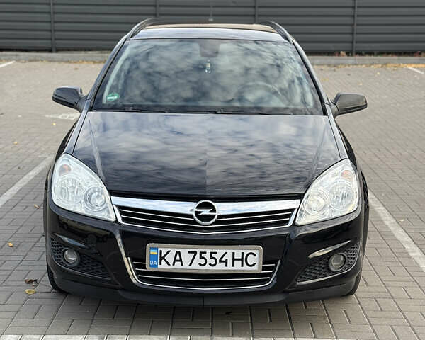 Черный Опель Астра, объемом двигателя 1.69 л и пробегом 223 тыс. км за 5900 $, фото 1 на Automoto.ua