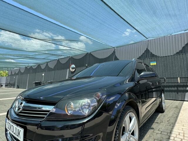 Черный Опель Астра, объемом двигателя 1.6 л и пробегом 171 тыс. км за 7100 $, фото 1 на Automoto.ua