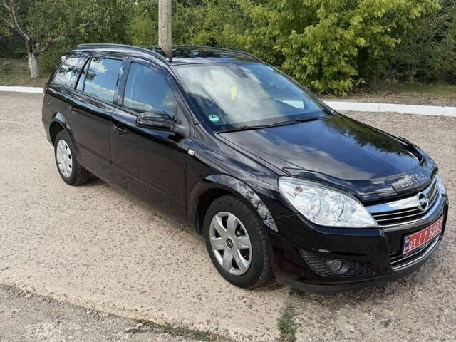 Черный Опель Астра, объемом двигателя 1.6 л и пробегом 161 тыс. км за 4950 $, фото 1 на Automoto.ua
