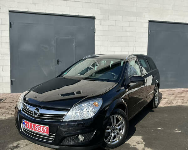Черный Опель Астра, объемом двигателя 1.6 л и пробегом 199 тыс. км за 5999 $, фото 1 на Automoto.ua