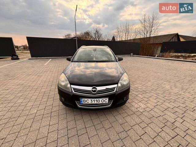 Черный Опель Астра, объемом двигателя 1.69 л и пробегом 274 тыс. км за 5600 $, фото 1 на Automoto.ua