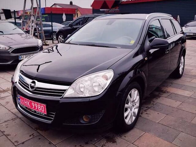 Черный Опель Астра, объемом двигателя 1.6 л и пробегом 237 тыс. км за 5350 $, фото 1 на Automoto.ua