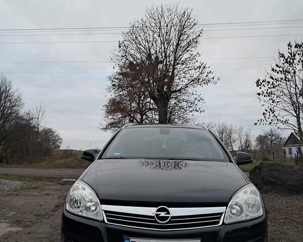 Черный Опель Астра, объемом двигателя 1.6 л и пробегом 216 тыс. км за 6200 $, фото 1 на Automoto.ua