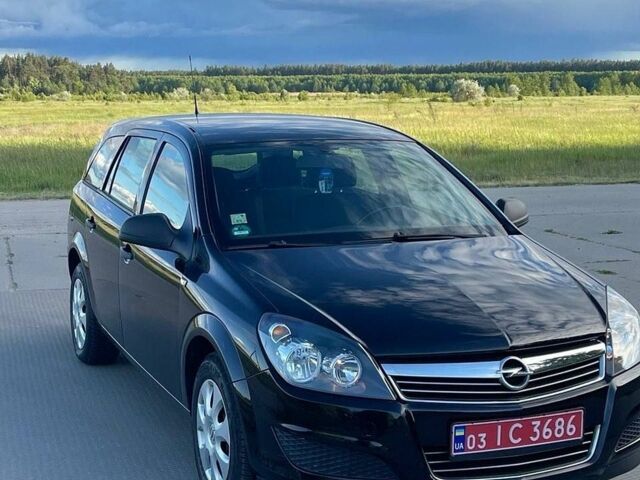 Черный Опель Астра, объемом двигателя 1.4 л и пробегом 135 тыс. км за 5650 $, фото 1 на Automoto.ua