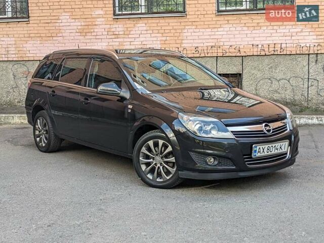 Черный Опель Астра, объемом двигателя 1.6 л и пробегом 226 тыс. км за 5600 $, фото 1 на Automoto.ua