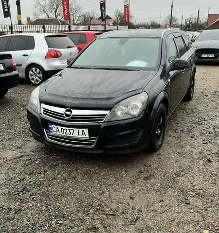 Черный Опель Астра, объемом двигателя 1.69 л и пробегом 242 тыс. км за 6200 $, фото 1 на Automoto.ua