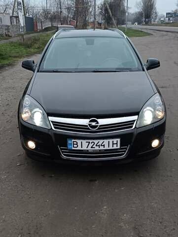 Черный Опель Астра, объемом двигателя 1.69 л и пробегом 246 тыс. км за 6500 $, фото 1 на Automoto.ua
