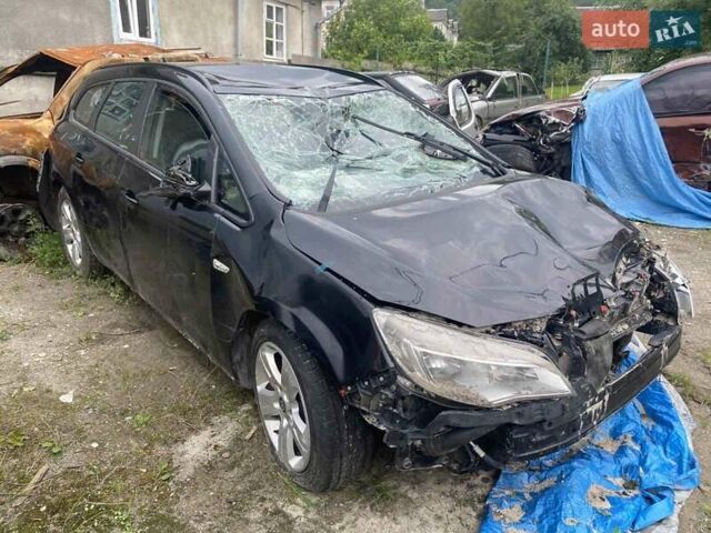 Черный Опель Астра, объемом двигателя 1.7 л и пробегом 180 тыс. км за 2100 $, фото 1 на Automoto.ua