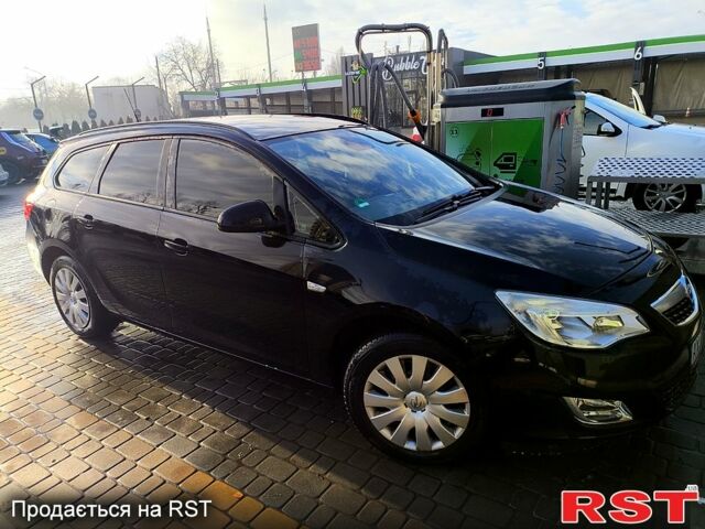 Черный Опель Астра, объемом двигателя 1.6 л и пробегом 182 тыс. км за 7700 $, фото 1 на Automoto.ua