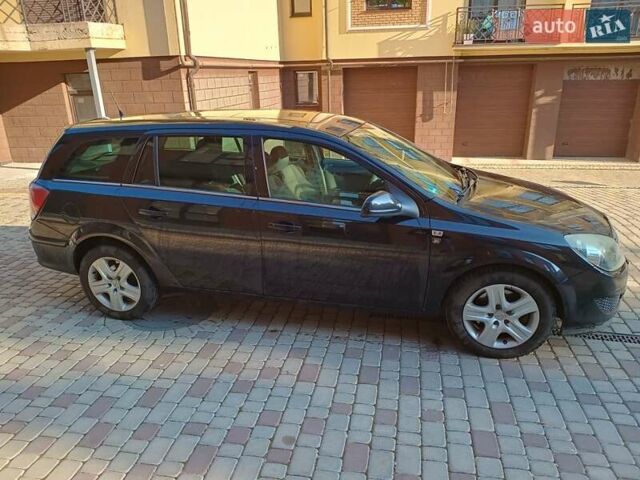 Чорний Опель Астра, об'ємом двигуна 1.69 л та пробігом 324 тис. км за 5700 $, фото 1 на Automoto.ua