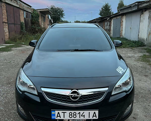 Черный Опель Астра, объемом двигателя 1.25 л и пробегом 196 тыс. км за 6800 $, фото 1 на Automoto.ua