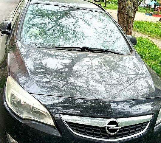 Чорний Опель Астра, об'ємом двигуна 1.2 л та пробігом 215 тис. км за 3200 $, фото 1 на Automoto.ua
