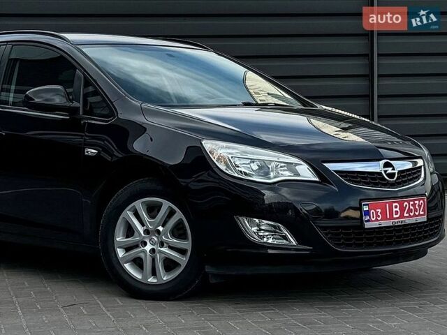 Черный Опель Астра, объемом двигателя 1.6 л и пробегом 200 тыс. км за 7700 $, фото 1 на Automoto.ua