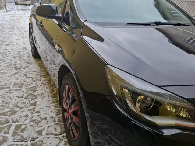 Черный Опель Астра, объемом двигателя 1.69 л и пробегом 222 тыс. км за 7500 $, фото 1 на Automoto.ua
