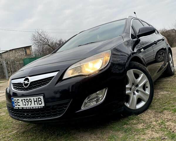 Черный Опель Астра, объемом двигателя 1.3 л и пробегом 280 тыс. км за 8200 $, фото 1 на Automoto.ua