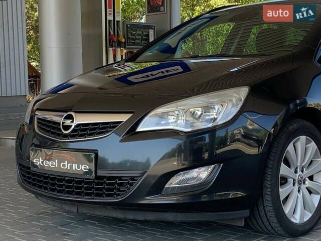 Черный Опель Астра, объемом двигателя 1.7 л и пробегом 238 тыс. км за 6799 $, фото 1 на Automoto.ua