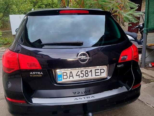 Черный Опель Астра, объемом двигателя 1.7 л и пробегом 202 тыс. км за 7000 $, фото 1 на Automoto.ua