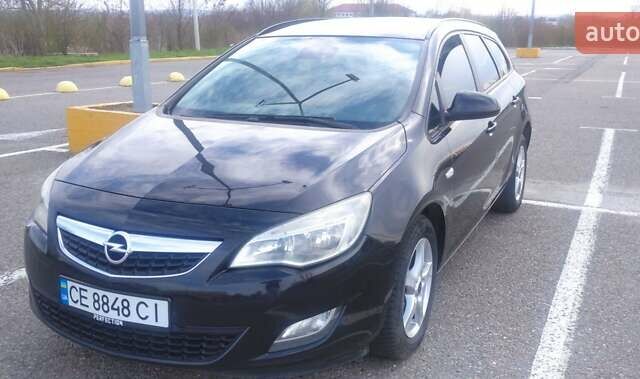 Черный Опель Астра, объемом двигателя 1.25 л и пробегом 300 тыс. км за 6500 $, фото 1 на Automoto.ua