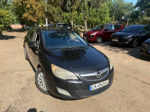 Чорний Опель Астра, об'ємом двигуна 1.2 л та пробігом 357 тис. км за 5493 $, фото 1 на Automoto.ua