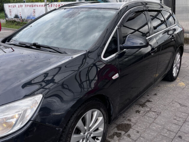 Черный Опель Астра, объемом двигателя 1.3 л и пробегом 193 тыс. км за 5800 $, фото 1 на Automoto.ua