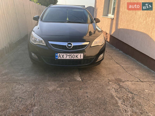 Чорний Опель Астра, об'ємом двигуна 1.69 л та пробігом 374 тис. км за 7200 $, фото 1 на Automoto.ua