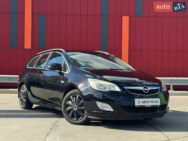 Черный Опель Астра, объемом двигателя 1.69 л и пробегом 345 тыс. км за 5990 $, фото 1 на Automoto.ua