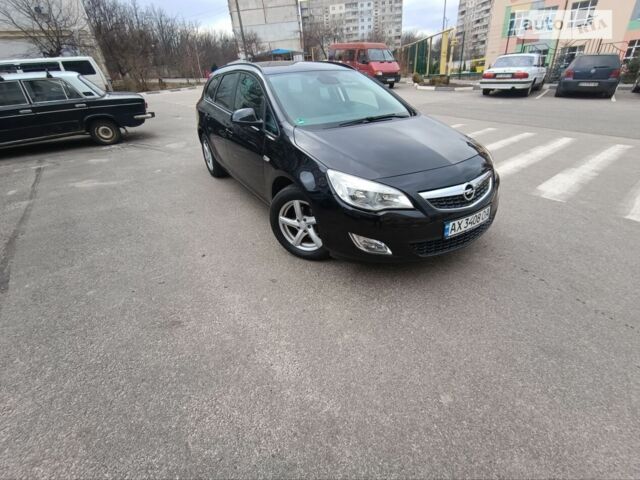 Черный Опель Астра, объемом двигателя 1.4 л и пробегом 225 тыс. км за 7799 $, фото 1 на Automoto.ua