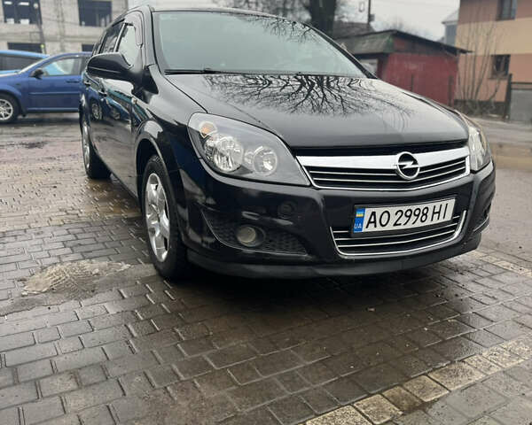 Черный Опель Астра, объемом двигателя 1.6 л и пробегом 170 тыс. км за 4600 $, фото 1 на Automoto.ua