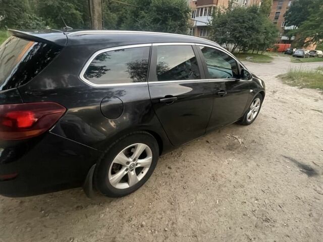 Черный Опель Астра, объемом двигателя 1.7 л и пробегом 266 тыс. км за 6801 $, фото 1 на Automoto.ua