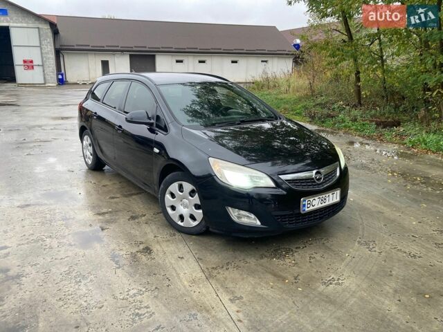 Чорний Опель Астра, об'ємом двигуна 1.25 л та пробігом 315 тис. км за 4450 $, фото 1 на Automoto.ua