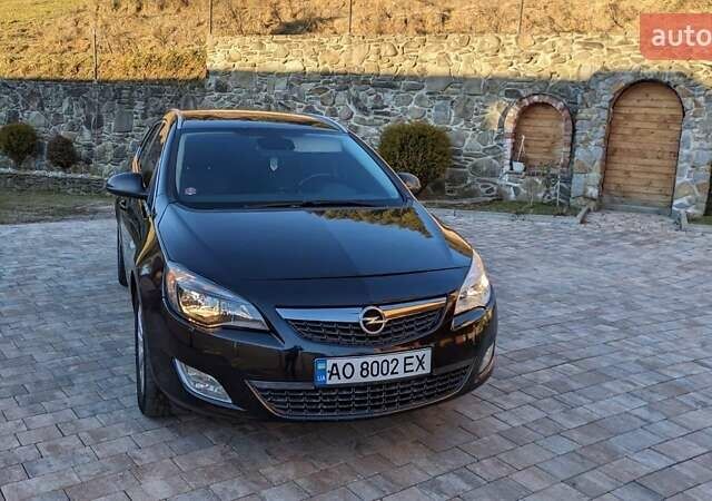 Черный Опель Астра, объемом двигателя 1.7 л и пробегом 230 тыс. км за 7000 $, фото 1 на Automoto.ua