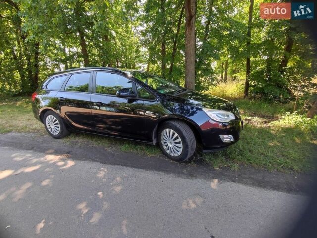 Черный Опель Астра, объемом двигателя 1.6 л и пробегом 202 тыс. км за 6900 $, фото 1 на Automoto.ua