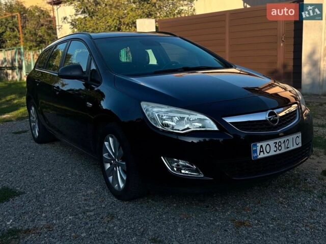 Черный Опель Астра, объемом двигателя 1.4 л и пробегом 158 тыс. км за 6500 $, фото 1 на Automoto.ua