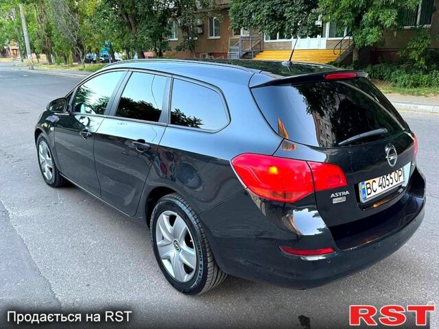 Черный Опель Астра, объемом двигателя 1.7 л и пробегом 263 тыс. км за 5800 $, фото 1 на Automoto.ua